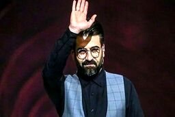 عکسی کمتر دیده شده از رسالت بوذری، مجری برنامه محفل و همسرش